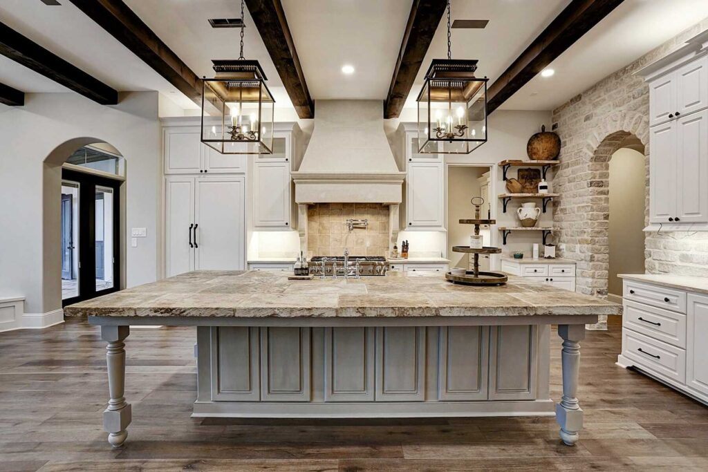 Spacious kitchen with large stone island