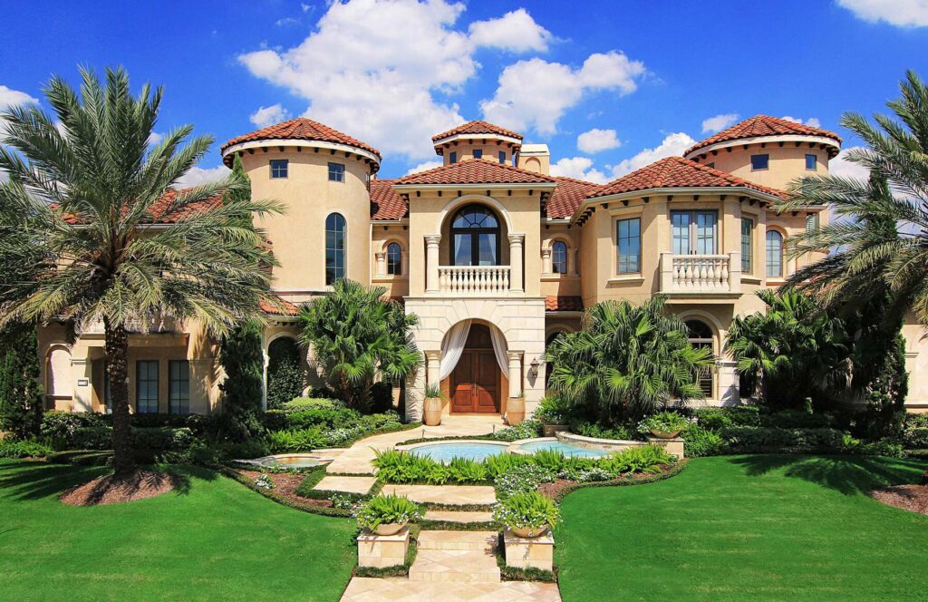 Mediterranean luxury home with palm trees