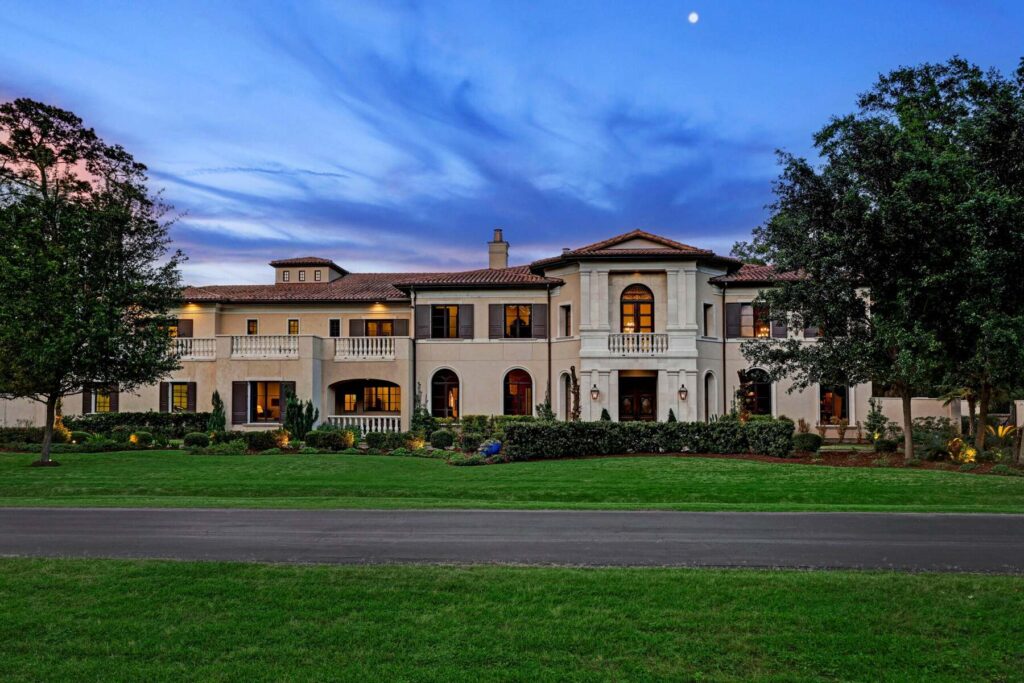 Large estate home at dusk
