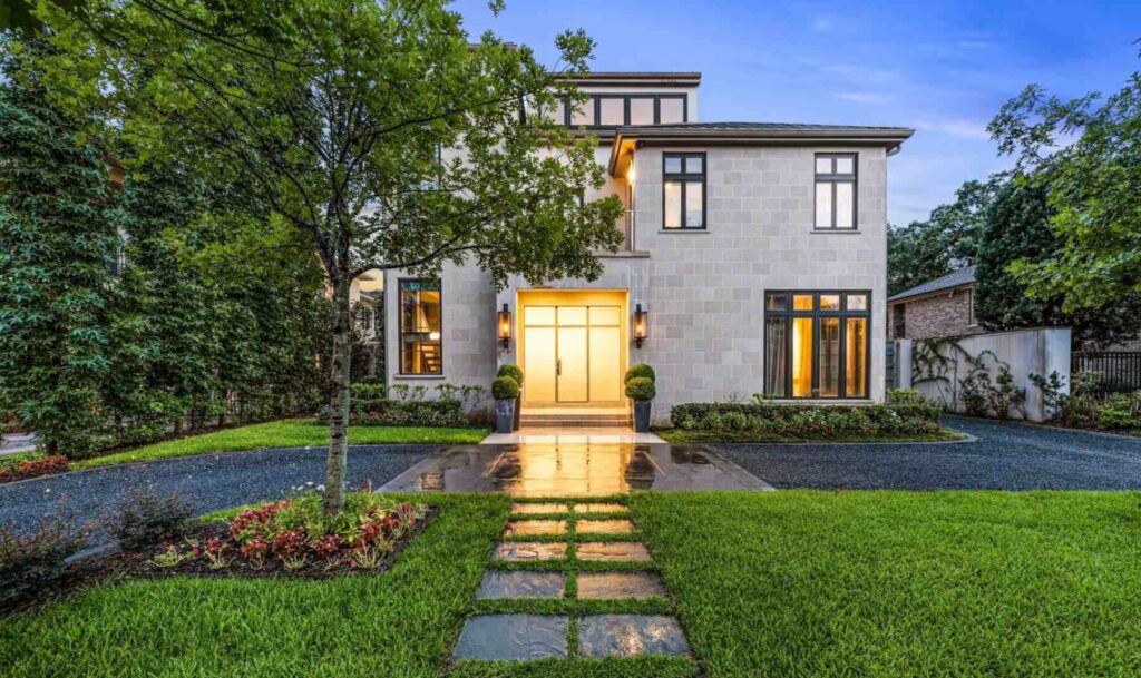 Modern luxury home exterior at dusk