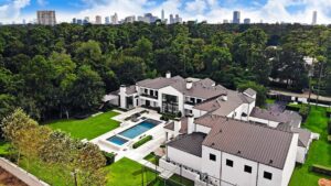 Aerial view of luxury estate with pool