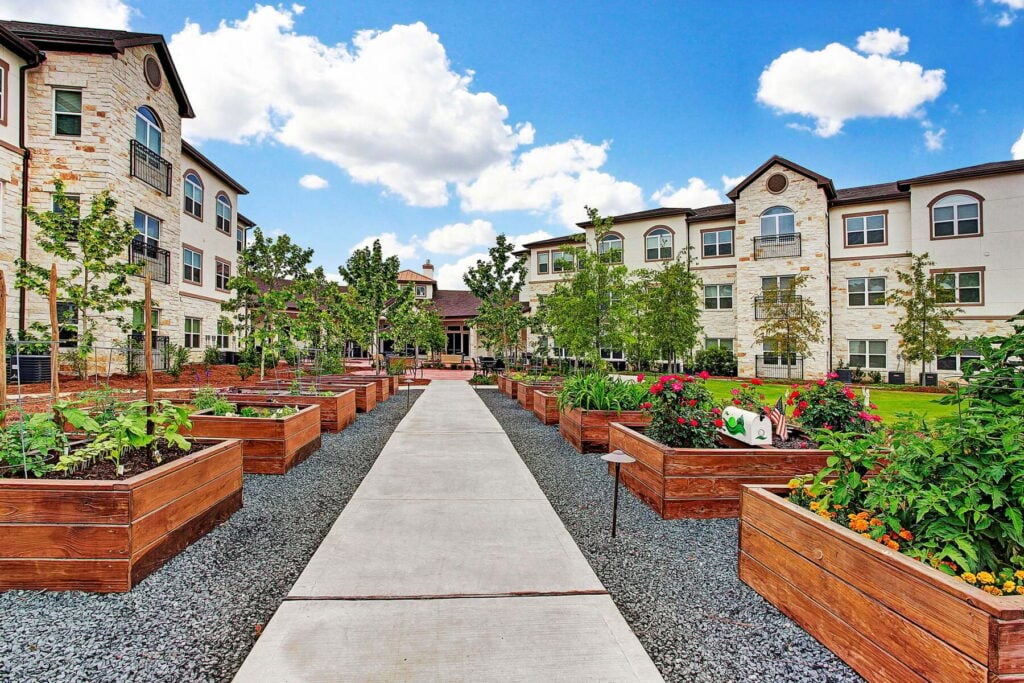 Apartment courtyard with raised garden beds