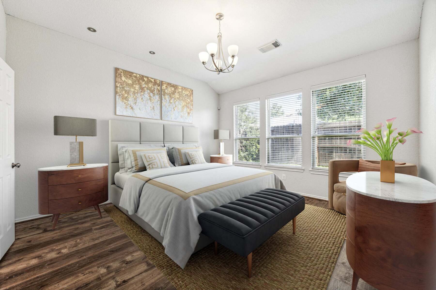 Staged bedroom with neutral decor and large windows