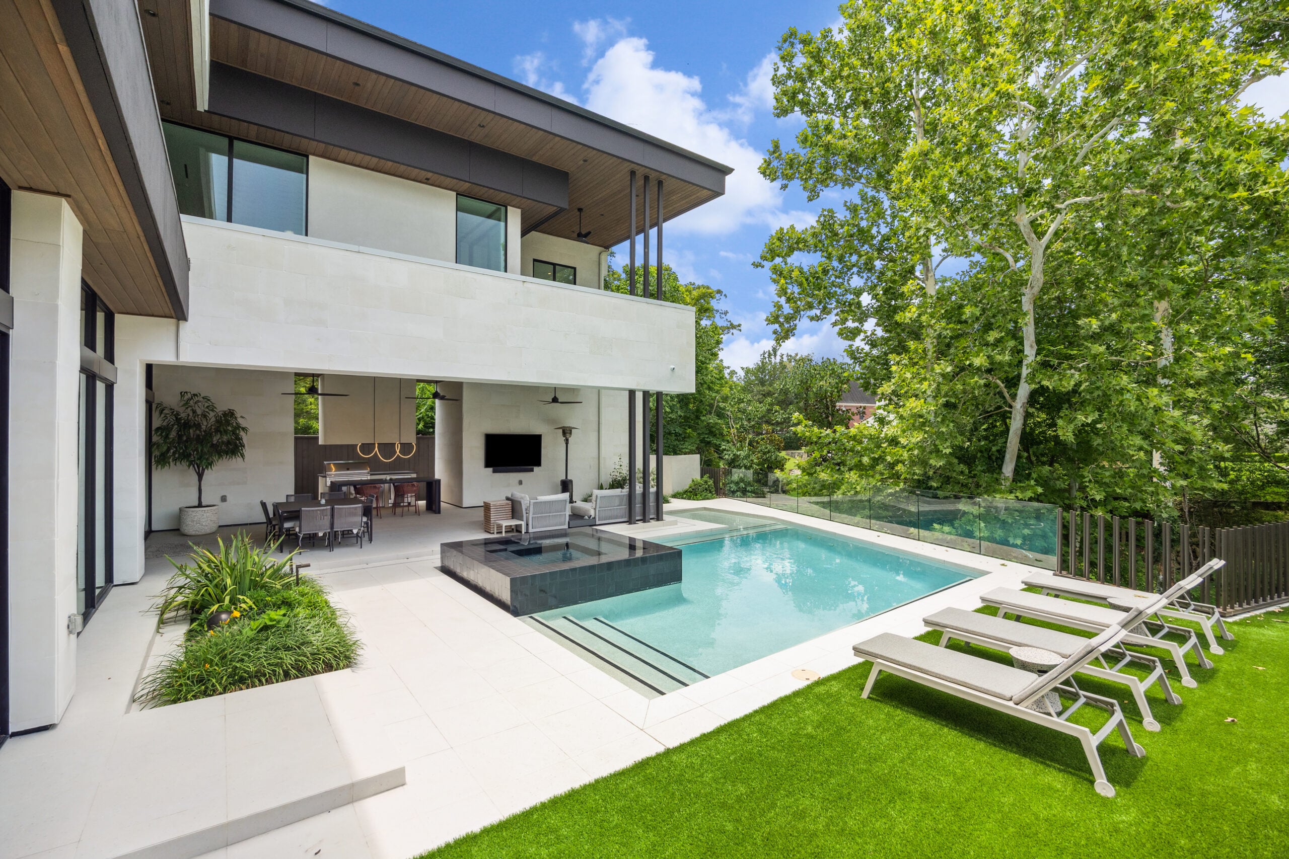 Modern new construction home with pool and patio