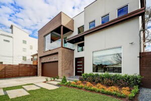 Modern new construction home with brick and stucco exterior